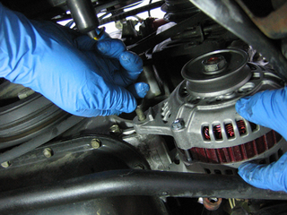 Illustration for article titled And You Will Know Us by the Trail of Parts: Replace an Alternator